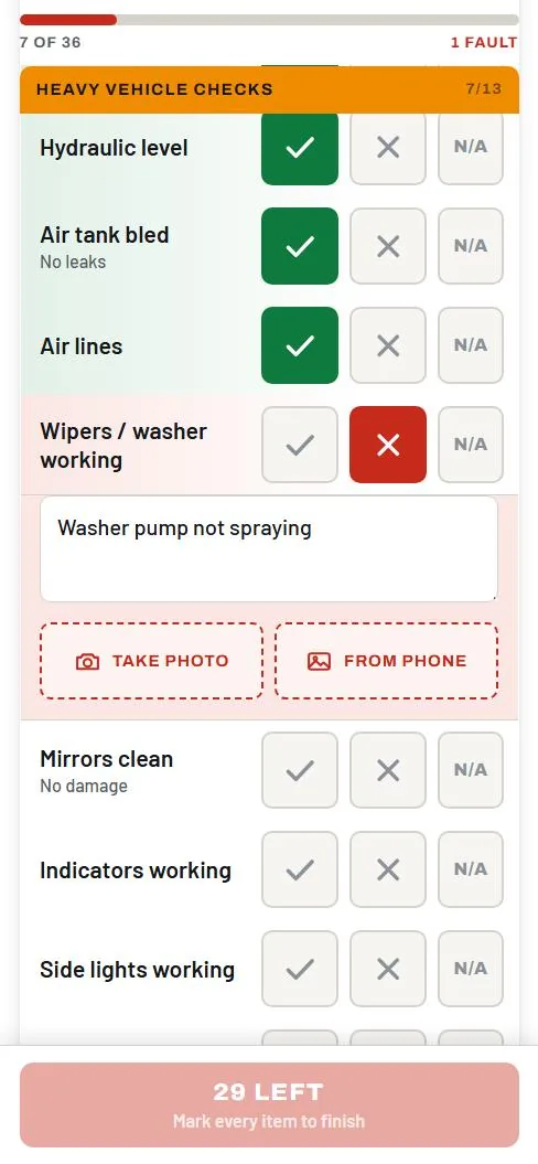 A driver reporting a fault part-way through a check, with a note and a photo button